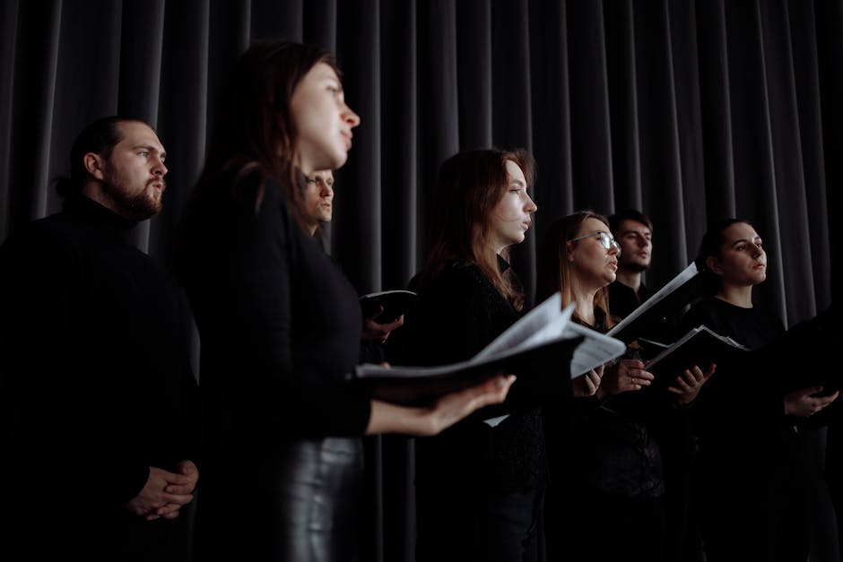 Image of a choir singing Gospel music on a stage